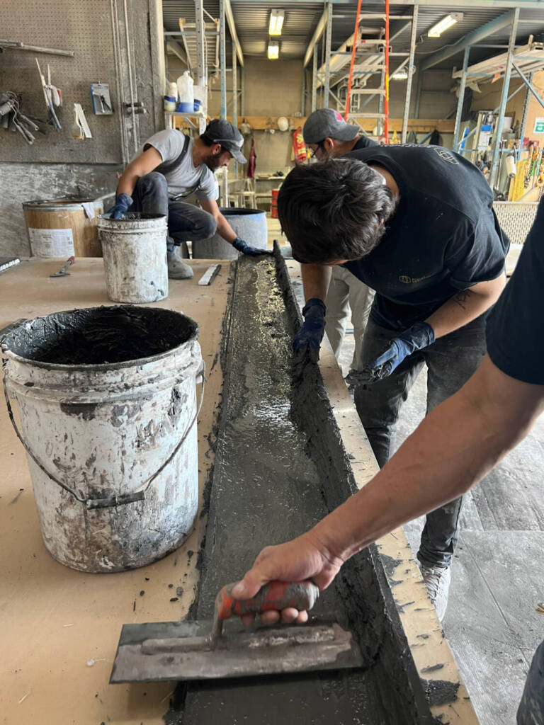 Workers moulding GFRC concrete