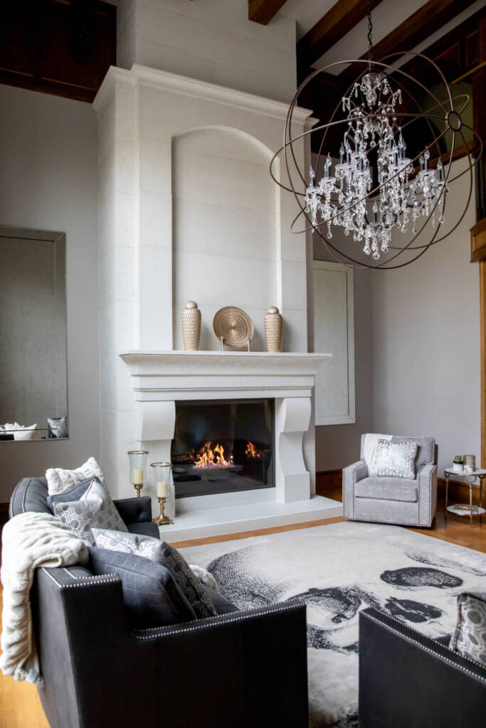 Floor to ceiling concrete fireplace and wall panel 